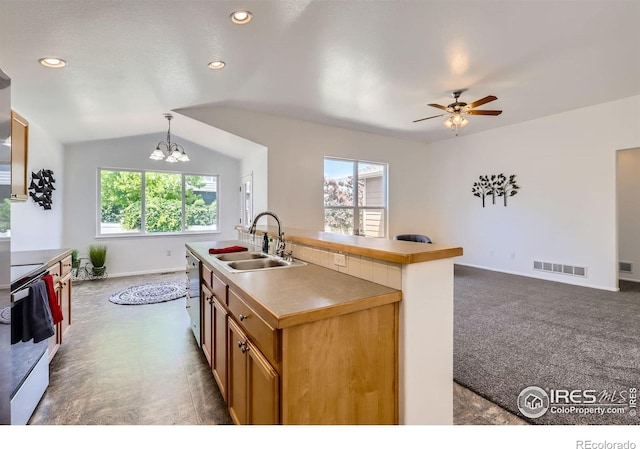 2244 Woodbury Ln, Fort Collins, CO 80524 - kitchen with white electric range, a chandelier, ceiling fan, lofted ceiling, and stainless steel dishwasher