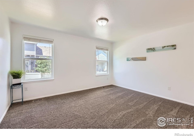 2244 Woodbury Ln, Fort Collins, CO 80524 - spare room with carpet floors