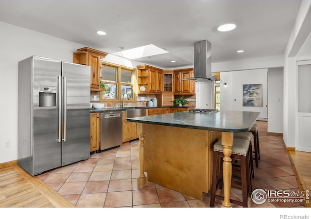 4223 Eldorado Springs Dr, Boulder, CO 80303 - kitchen featuring stainless steel appliances, island exhaust hood, open shelves, dark countertops, and recessed lighting