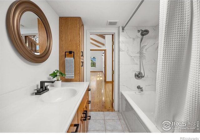 4223 Eldorado Springs Dr, Boulder, CO 80303 - full bath with shower / tub combo, vanity, and tile patterned flooring