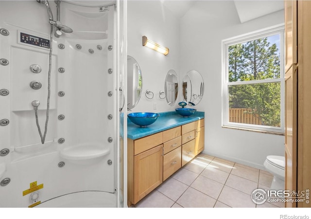 4223 Eldorado Springs Dr, Boulder, CO 80303 - full bathroom featuring double vanity, a shower, and tile patterned flooring