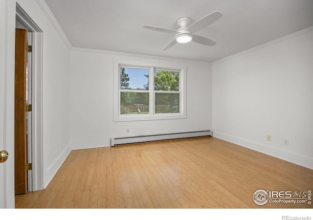 4223 Eldorado Springs Dr, Boulder, CO 80303 - spare room with a baseboard heating unit, wood finished floors, a ceiling fan, and ornamental molding