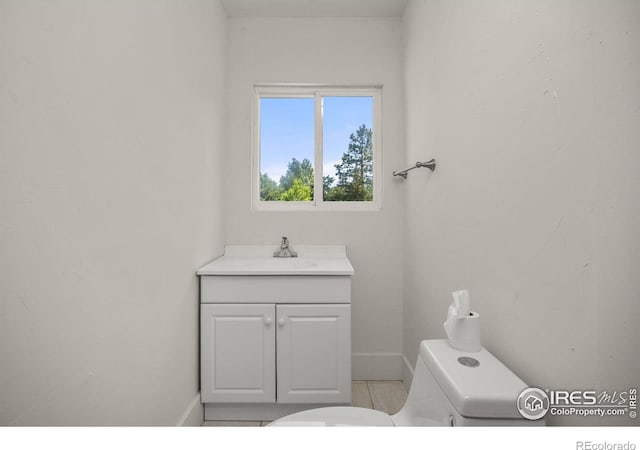 4223 Eldorado Springs Dr, Boulder, CO 80303 - half bathroom with vanity and tile patterned floors