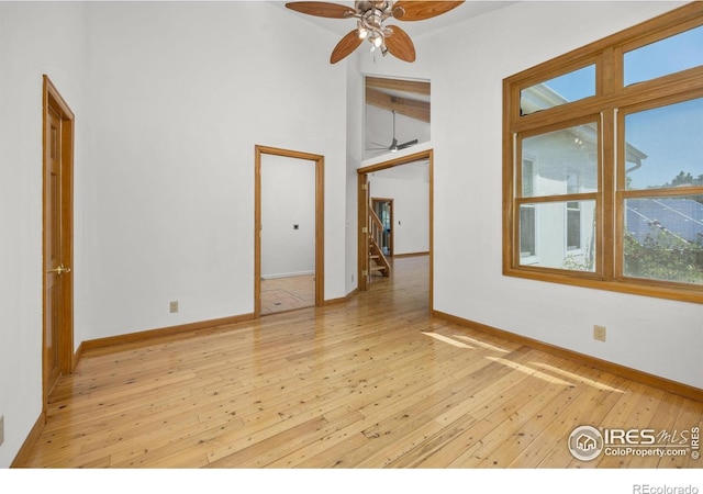 4223 Eldorado Springs Dr, Boulder, CO 80303 - unfurnished room featuring hardwood / wood-style flooring, ceiling fan, and stairs