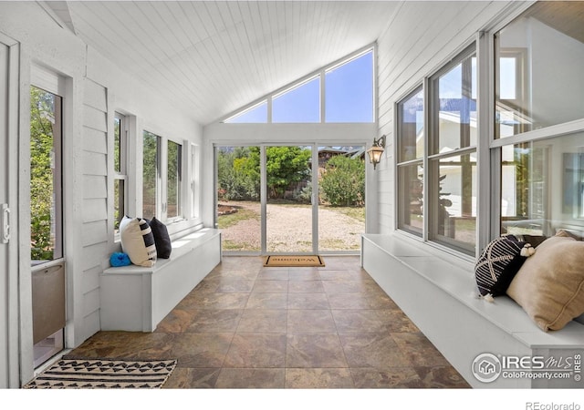 4223 Eldorado Springs Dr, Boulder, CO 80303 - sunroom with vaulted ceiling and stone finish flooring