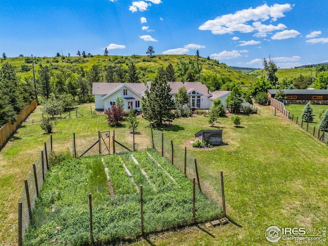 4223 Eldorado Springs Dr, Boulder, CO 80303 - view of green lawn with a vegetable garden
