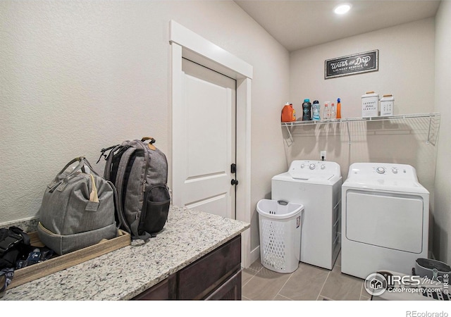 285 High Point Dr Unit H-104, Longmont, CO 80504 - washroom featuring washer and dryer and recessed lighting