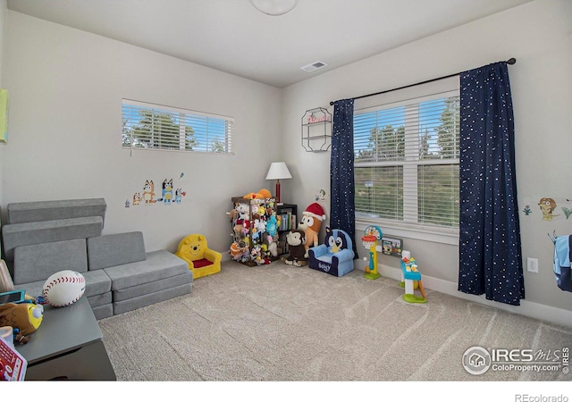 285 High Point Dr Unit H-104, Longmont, CO 80504 - recreation room featuring carpet