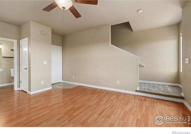 6925 19th St Unit 15, Greeley, CO 80634 - unfurnished living room with a ceiling fan and light wood-type flooring