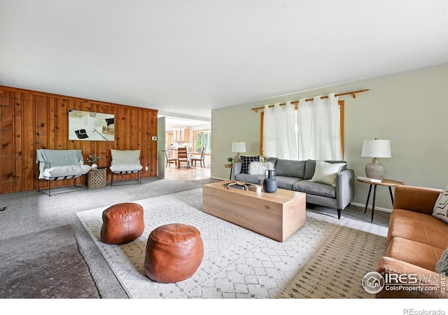 775 Pleasant St, Boulder, CO 80302 - living area with wooden walls and baseboards