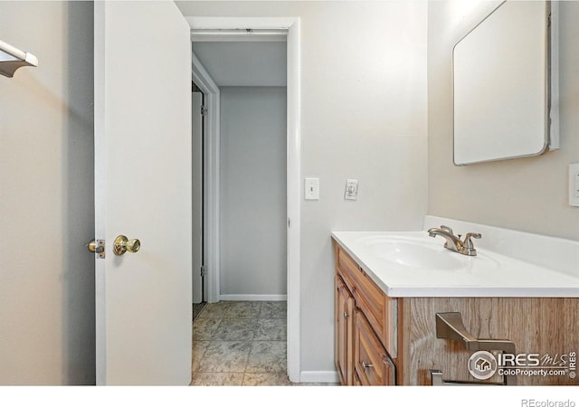 775 Pleasant St, Boulder, CO 80302 - bathroom featuring vanity and baseboards