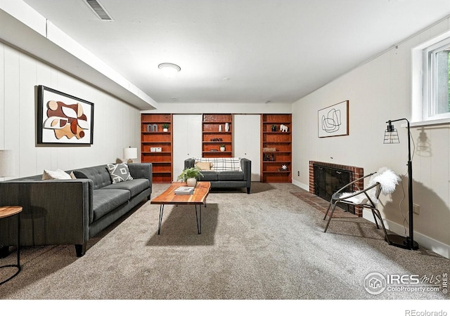 775 Pleasant St, Boulder, CO 80302 - carpeted living room with a fireplace and baseboards