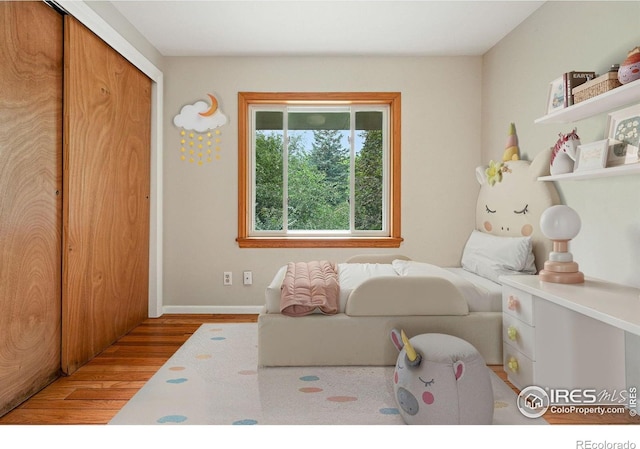 775 Pleasant St, Boulder, CO 80302 - bedroom featuring wood finished floors and a closet