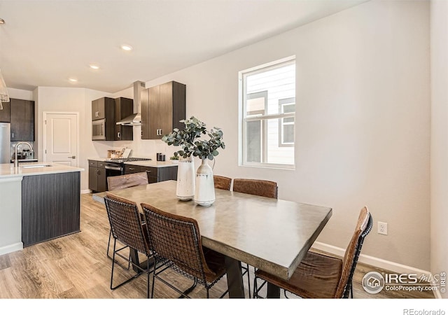 2290 Walbridge Rd, Fort Collins, CO 80524 - dining area with light wood-type flooring and recessed lighting