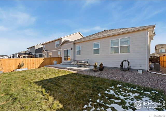 9873 Ceylon St, Commerce City, CO 80022 - rear view of house featuring a patio