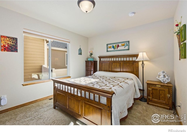 1613 Alpine Ave, Berthoud, CO 80513 - carpeted bedroom with baseboards