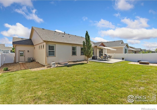 1613 Alpine Ave, Berthoud, CO 80513 - rear view of property featuring a patio, a fenced backyard, and a shingled roof