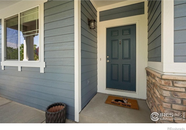 5127 Exploration Ln, Fort Collins, CO 80528 - entrance to property featuring covered porch