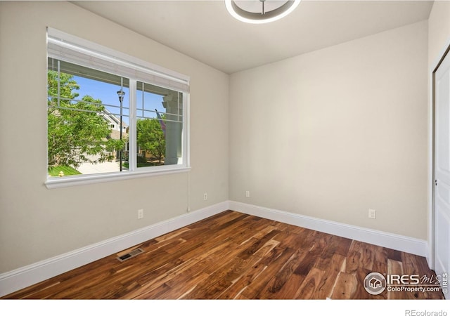 5127 Exploration Ln, Fort Collins, CO 80528 - spare room with baseboards and wood finished floors