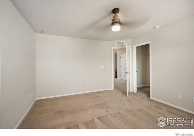 5127 Exploration Ln, Fort Collins, CO 80528 - unfurnished bedroom featuring carpet and ceiling fan