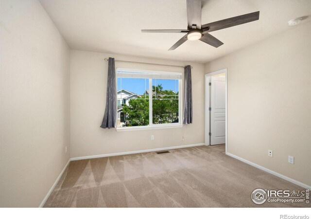 5127 Exploration Ln, Fort Collins, CO 80528 - carpeted spare room with a ceiling fan and a smoke detector