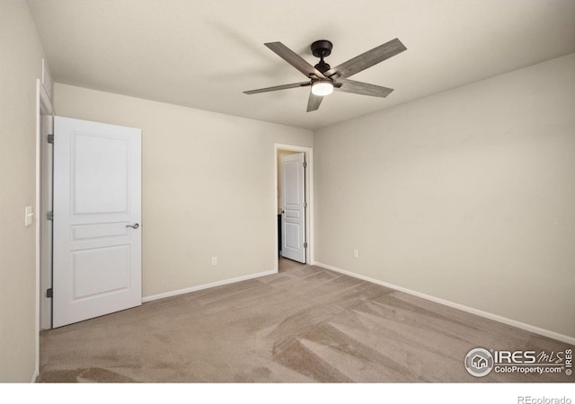 5127 Exploration Ln, Fort Collins, CO 80528 - unfurnished bedroom with carpet and a ceiling fan