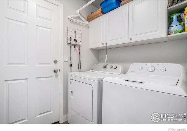 1201 102nd Ave, Greeley, CO 80634 - laundry area with washer and dryer and cabinet space