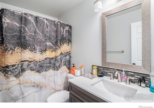 1201 102nd Ave, Greeley, CO 80634 - full bath with tasteful backsplash, vanity, and curtained shower