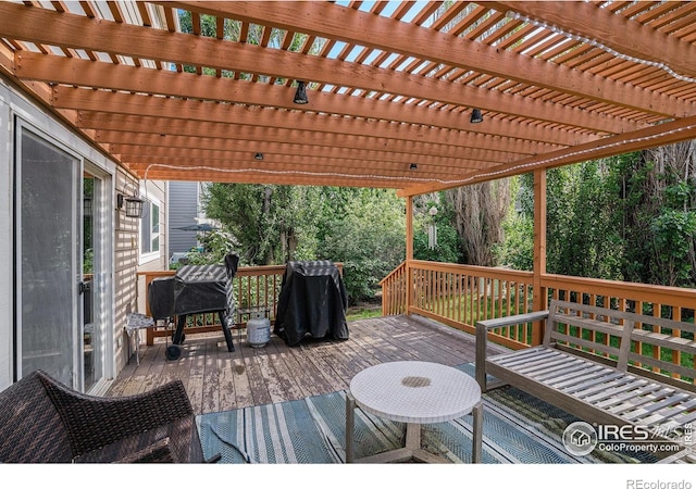 1201 102nd Ave, Greeley, CO 80634 - wooden terrace with a pergola