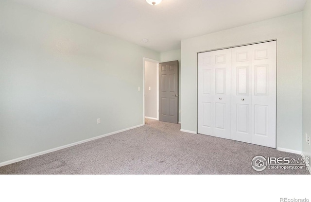 1937 Mahogany Way, Severance, CO 80550 - unfurnished bedroom with carpet floors and a closet