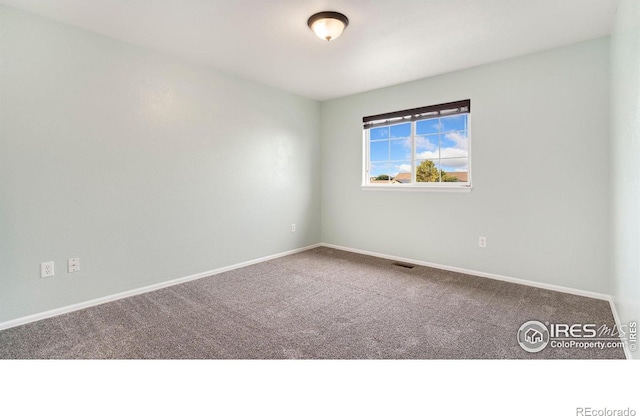 1937 Mahogany Way, Severance, CO 80550 - spare room with carpet and baseboards