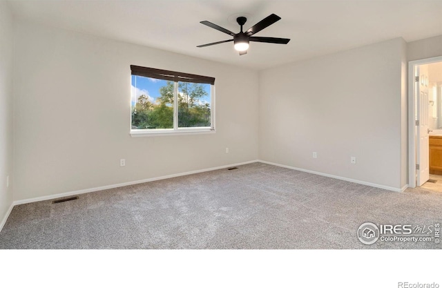 1937 Mahogany Way, Severance, CO 80550 - carpeted spare room with baseboards and a ceiling fan