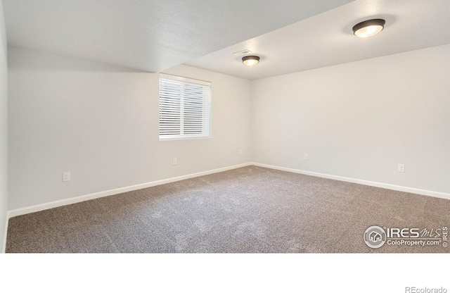 1937 Mahogany Way, Severance, CO 80550 - unfurnished room with carpet floors and baseboards