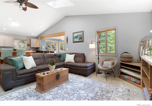 3727 Gamble Gulch Rd, Black Hawk, CO 80422 - carpeted living area with lofted ceiling, a ceiling fan, a skylight, and recessed lighting