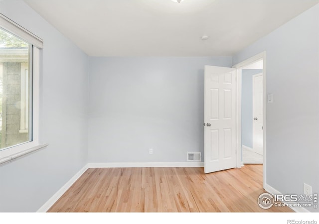 4240 Harlan St, Wheat Ridge, CO 80033 - spare room with wood finished floors and baseboards