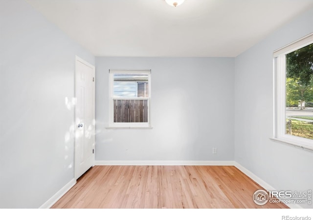 4240 Harlan St, Wheat Ridge, CO 80033 - empty room featuring light wood finished floors and baseboards