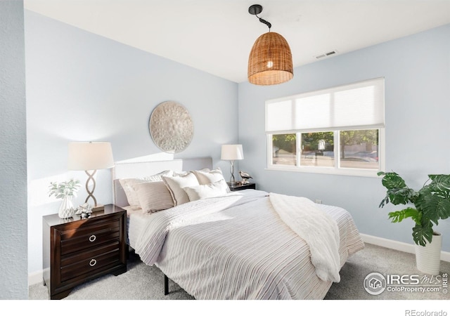 4240 Harlan St, Wheat Ridge, CO 80033 - carpeted bedroom featuring baseboards