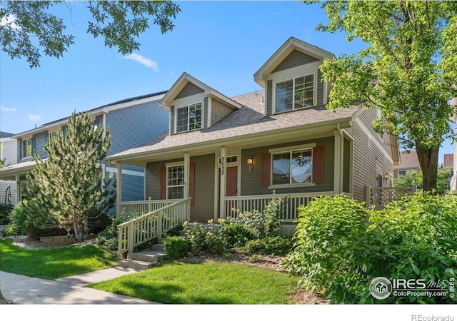 3632 Cassiopeia Ln, Fort Collins, CO 80528 - view of front of house with a porch and a shingled roof