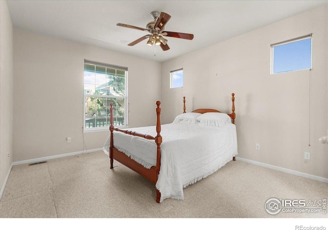 3632 Cassiopeia Ln, Fort Collins, CO 80528 - carpeted bedroom featuring baseboards and a ceiling fan