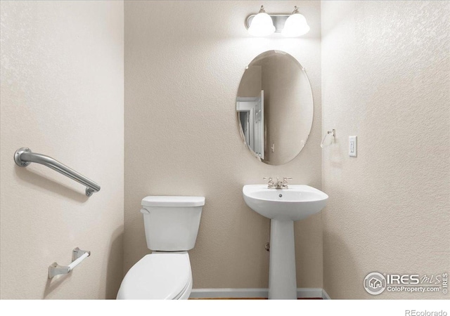 3632 Cassiopeia Ln, Fort Collins, CO 80528 - half bath with toilet and a sink