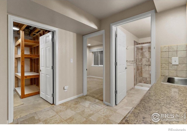 3632 Cassiopeia Ln, Fort Collins, CO 80528 - full bathroom with a shower stall and baseboards