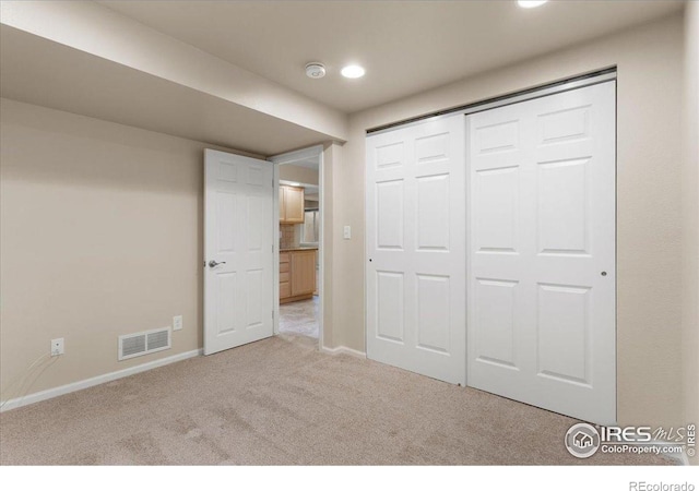 3632 Cassiopeia Ln, Fort Collins, CO 80528 - unfurnished bedroom featuring carpet, a closet, and recessed lighting