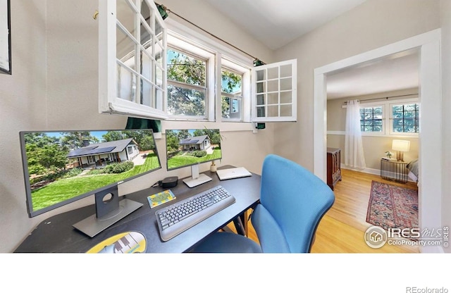 5326 Lowell Blvd, Denver, CO 80221 - home office featuring wood finished floors