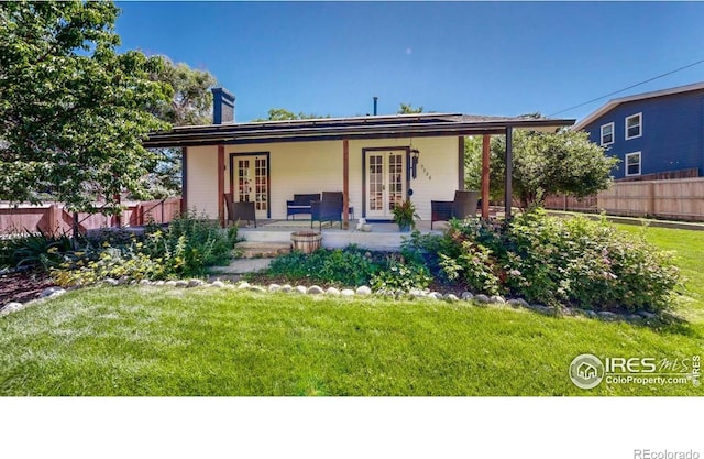 5326 Lowell Blvd, Denver, CO 80221 - rear view of property with french doors and a chimney