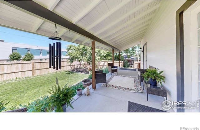 5326 Lowell Blvd, Denver, CO 80221 - fenced backyard featuring a patio and an outdoor hangout area