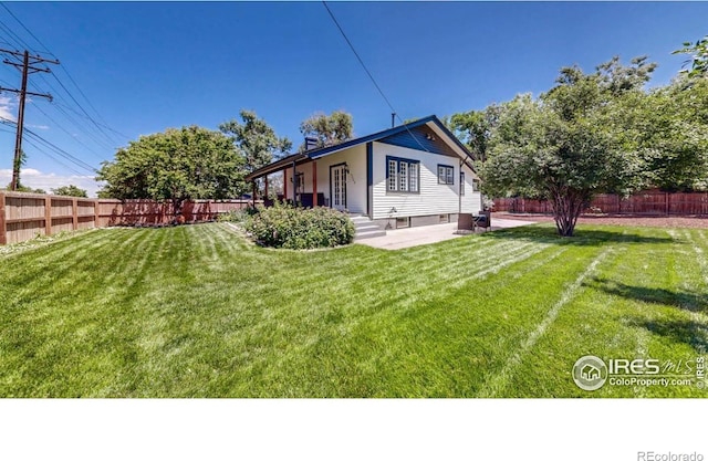 5326 Lowell Blvd, Denver, CO 80221 - back of house with a patio