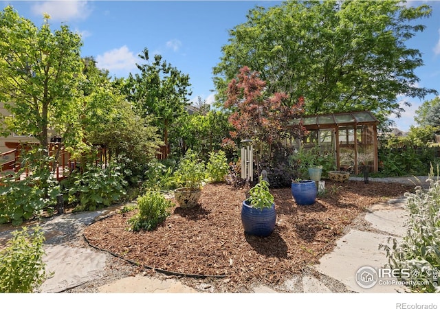 1026 Red Oak Dr, Longmont, CO 80504 - view of yard with an exterior structure and an outbuilding
