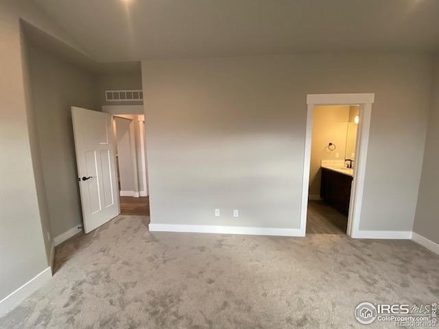 7156 Feather Reed Dr, Wellington, CO 80549 - unfurnished bedroom with baseboards and carpet flooring