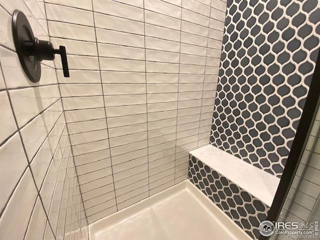 7156 Feather Reed Dr, Wellington, CO 80549 - bathroom featuring a tile shower