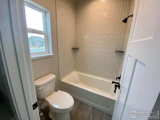 7156 Feather Reed Dr, Wellington, CO 80549 - bathroom with plenty of natural light and  shower combination